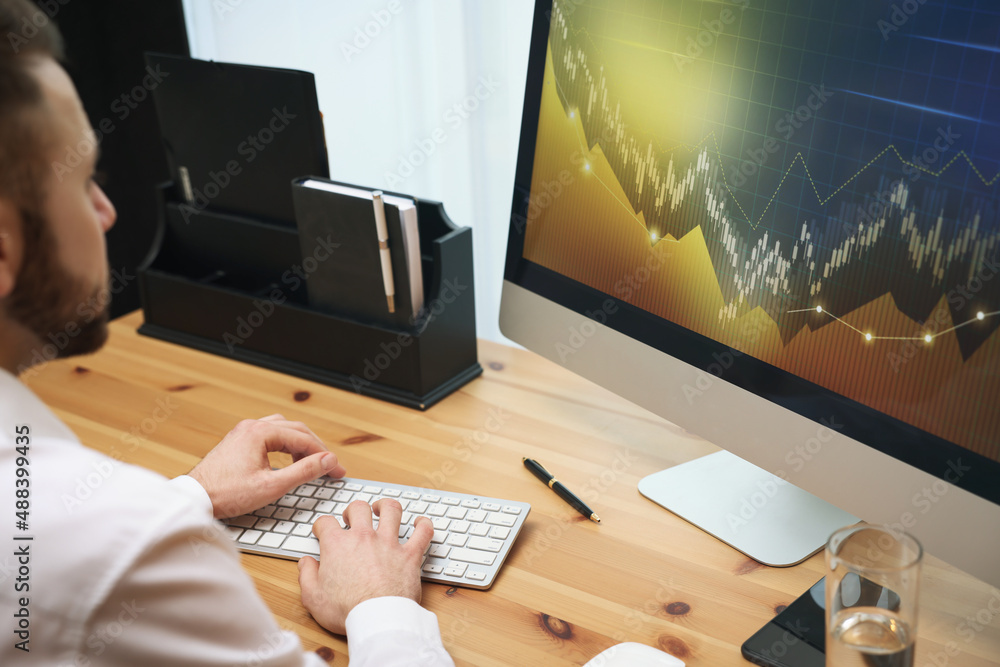 Poster forex trader working with computer in office