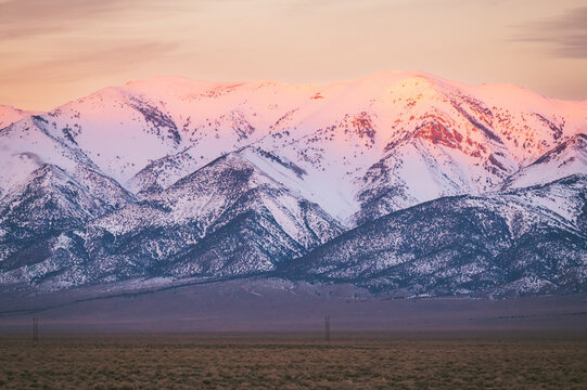 Sunrise alpenglow on the Nevada mountains in the desert