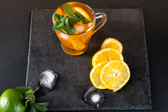 Tea With Ice And Lemon. Sliced Lemon And Ice Cubes For Tea. View From Above.