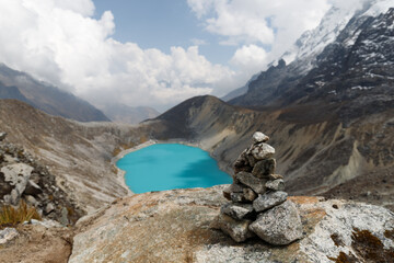 Hidden crystal clear blue lake along the top of Salkantay trek (Inka Trail alternative) from Cusco...