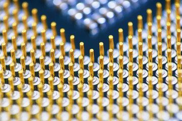 cpu gold pins and chip, microchip processor legs computer component technology. Macro photography...