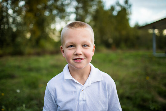 Portrait of young handsome boy outdoors.