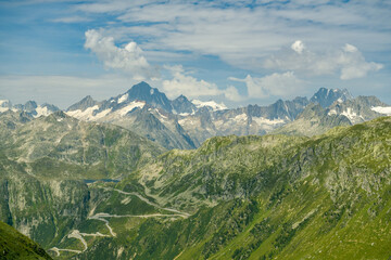 View on Grimsel high mountain pass and surrounding mountains in Swiss Alps