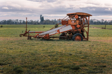 combine harvester in field