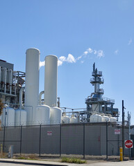 oil refinery emitting air pollution from its chimney