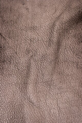 Closeup detail of leather texture background.