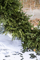 Beautiful wedding arch of flowers for the newlyweds. Decoration on a holiday