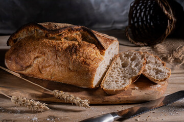 White wheat sliced ​​bread on a wooden table