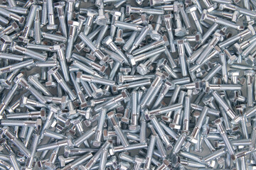 metal fasteners bolt background. top view
