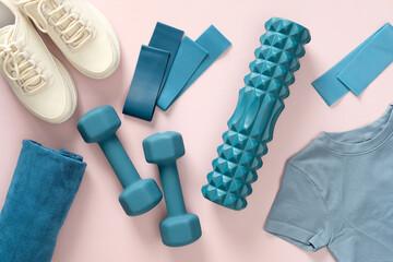 Fitness gym accessories with feminine sportswear on pink background top view - obrazy, fototapety, plakaty