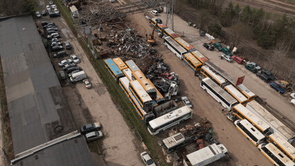 Old Car Metal Scrap Yard with excavator Sorting out old parts