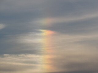 Sunset in the cloudy sky, with a rainbow, In gatlinberg Tennessee. 