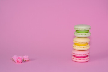 Macaroni with sweet almonds or dessert cake made of almond cookies, painted in the fashionable color of 2022. Very beautiful background.