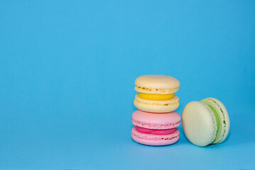 Macaroni with sweet almonds or dessert cake made of almond cookies, painted in the fashionable color of 2022. Very beautiful background.