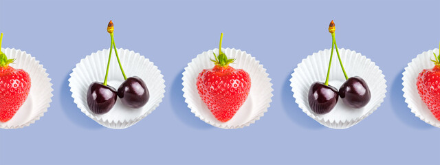 Seamless Pattern of strawberries and cherries in paper baskets