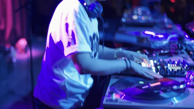 Handheld Shot of DJ Scratching