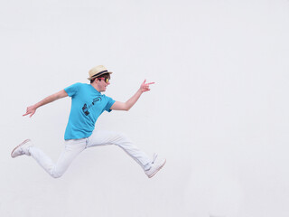 YOUNG BOY JUMPING FROM JOY