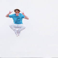 YOUNG BOY JUMPING FROM JOY
