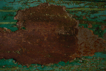 Old grunge rusty background. Old shabby green paint. Dark concept.