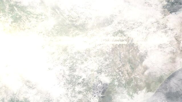 Earth zoom in from outer space to city. Zooming on South Sudan, Juba. The animation continues by zoom out through clouds and atmosphere into space. Images from NASA