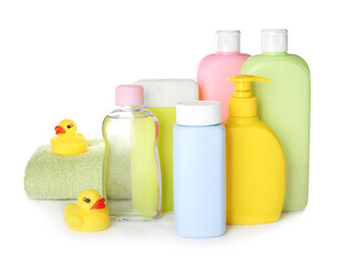 Obraz na płótnie Canvas Bottles of baby cosmetic products, towel and rubber ducks on white background