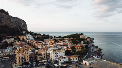 Fototapeta na wymiar Panoramic landscape of Mondello Beach in Palermo, Sicily. Aerial view of a Mediterranean coastal town.