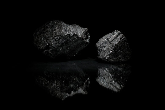 Relief stones with reflection. Photo for a desktop and home screen .Minerals in reflection. A desktop image.
