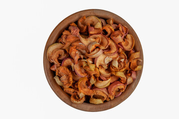 Dried apples in a bowl on white background