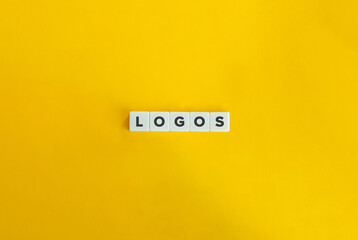 Logos Word on Letter Tiles on Yellow Background. Minimal Aesthetics.