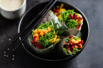 Rice paper roll with vegetables on plate