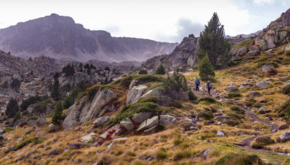 People hiking in the Pyrenees mountains, Andorra, Pessons - obrazy, fototapety, plakaty