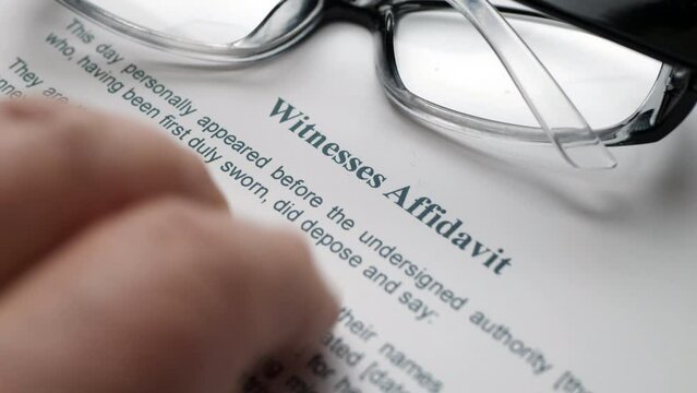 Finger tapping on witnesses affidavit form