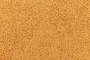 Sand texture. Sandy beach for background. Top view. Natural sand stone texture background. sand on the beach as background. Wavy sand background for summer designs