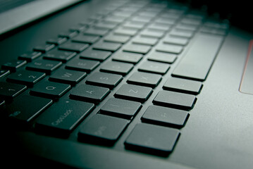 Computer keyboard in a laptop. Computer keys in close-up.