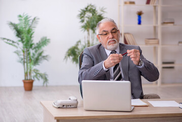 Old male employee and too much work in the office