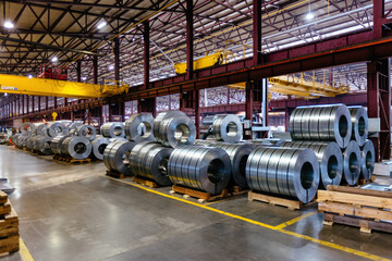 Rolls of galvanized steel sheet inside the factory or warehouse