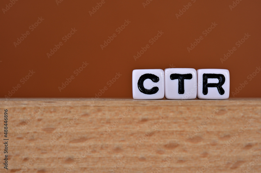 Poster word cubes lined up with the letters ctr written on it. it is an abbreviation for click through rate