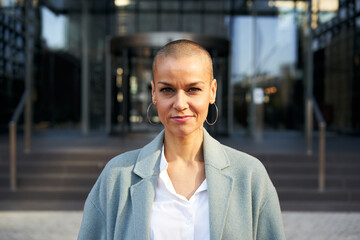 Portrait of a middle-aged lady looking at the camera. Empowered and self-confident woman