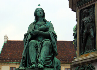 Fototapeta na wymiar Vienna. Austria. Statue Emperor Franz I in In de Burg in Hofburg palace complex. Sculptor Pompeo Marchesi. Woman statue symbolizing Peace, Strength, Faith and Justice.