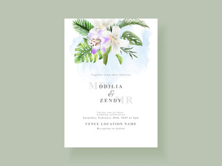 Beautiful tropical leaves wedding invitation card template