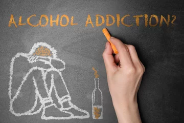 Fotobehang Alcohol addiction? - We can help you. Closeup view of woman writing with chalk on blackboard © New Africa