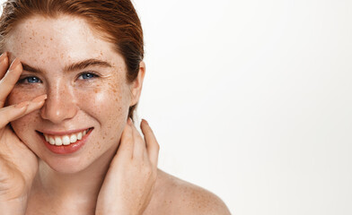 Plus size beauty concept. Curvy redhead model with freckles and white healthy smile. Chubby woman...