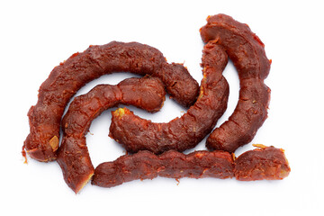 Pile of tamarind fruits on white background. Top view. Flat lay.
Sticky brown acidic pulp from the pod of a tree of the pea family, widely used as a flavoring in Asian cooking.