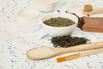 DIY natural cosmetics, rice water, tea tincture and coffee soap on a light background