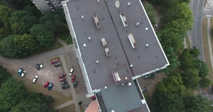 Dynamic Drone Shot Of Apartment Building Rooftop 4K