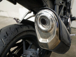 closeup of motorcycle exhaust system.	