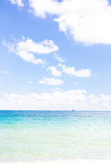 Fototapeta na wymiar Beach, ocean and sky in light colors