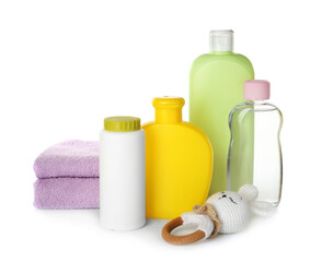 Set of baby cosmetic products, towels and toy on white background