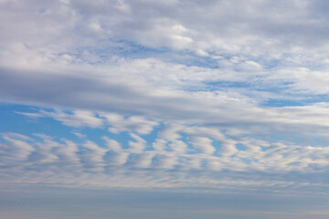 Clouds under a blue sky