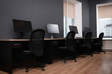 Many modern computers in open space office